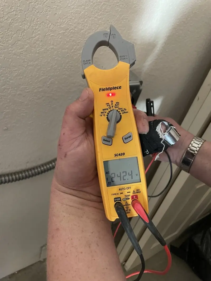 Voltage testing with clamp meter during Generator Installation in Martinsburg